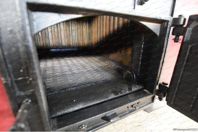 Колосниковая топка котла 1.1 МВт работающего без дымососа